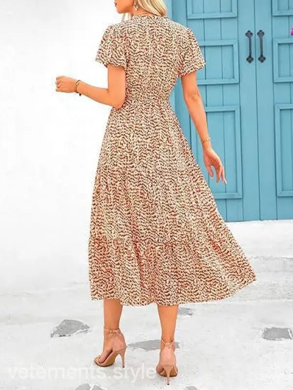 Floral print bubble pleated dress with short sleeves and cinched waist for elegance