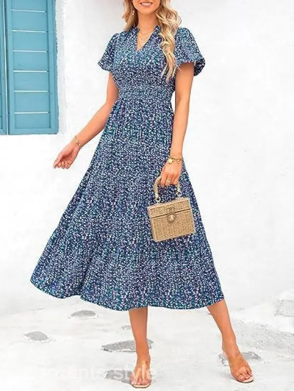 Blue floral print bubble pleated dress with short sleeves and wicker handbag accessory