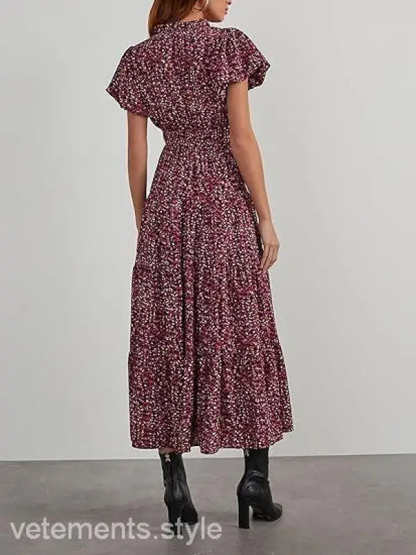 Floral print maxi dress featuring flutter sleeves and a cinched waist in Bubble Pleated design