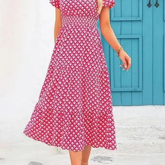 Pink and white floral midi dress features short sleeves and a v-neckline, perfect bubble pleated dress