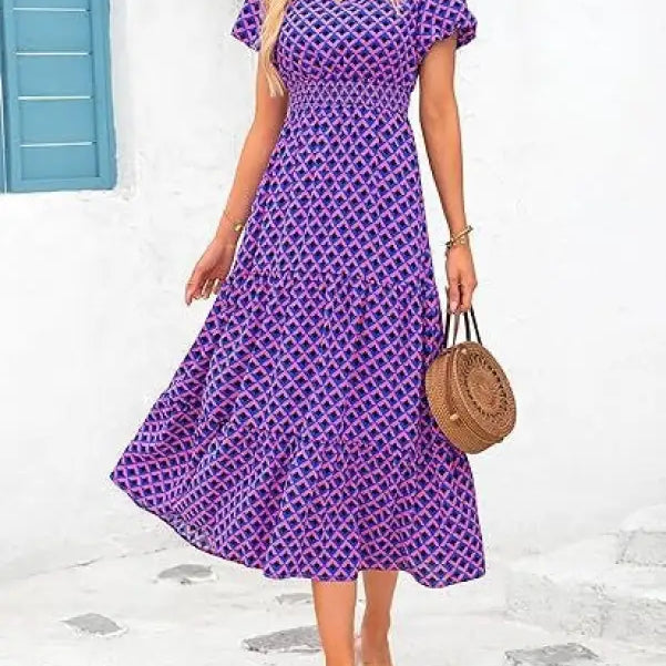 Purple and blue patterned bubble pleated dress with short sleeves and v-neck design
