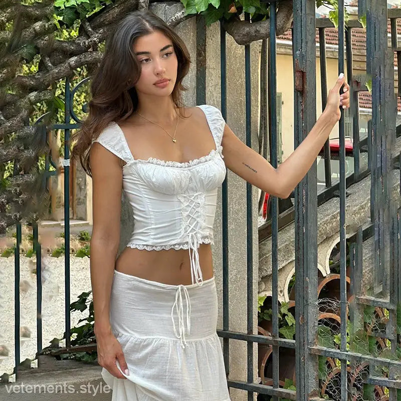 Woman wearing an Elegant French Collar Top with Lace Stitching Skirt ideal for summer