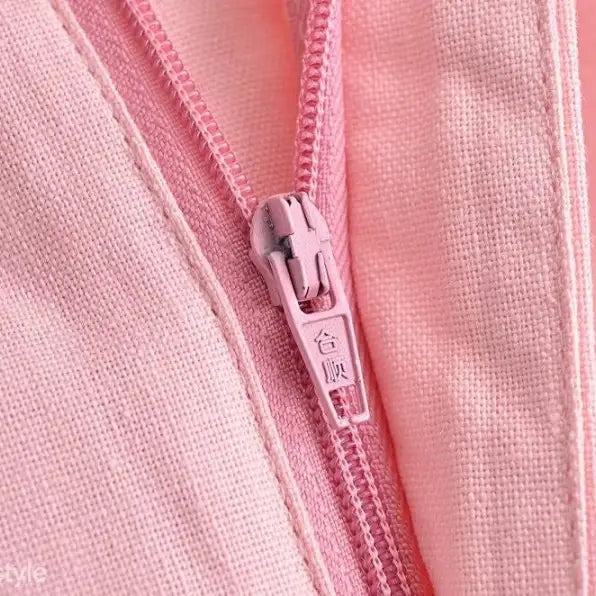 Elegant French style sleeveless dress featuring a pink zipper on polyester fabric