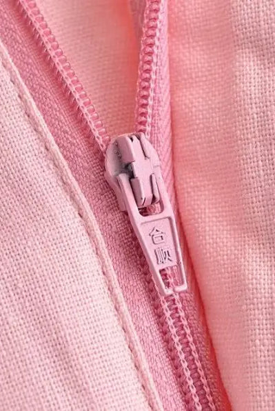 Elegant French style sleeveless dress featuring a pink zipper on polyester fabric