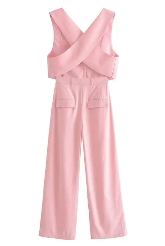 Pink sleeveless jumpsuit in elegant French style with V-neck design made of polyester