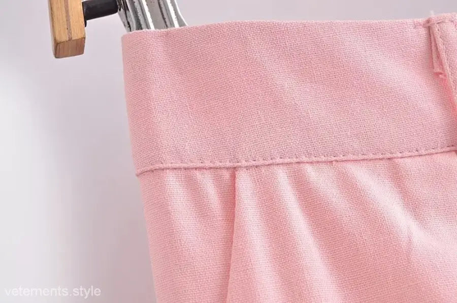 Pink fabric garment waistband of the elegant French style sleeveless V-Neck polyester dress