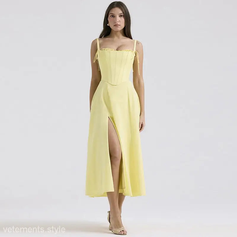 Yellow sundress with spaghetti straps and side slit from the Elegant Girdle Dress collection