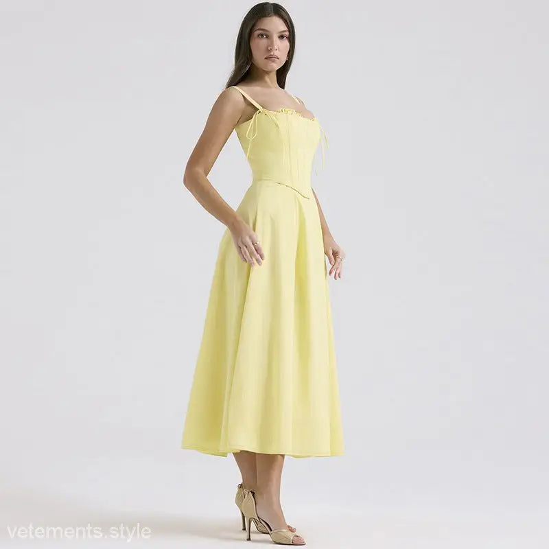 Yellow sleeveless midi elegant girdle dress with lace accents and flared skirt