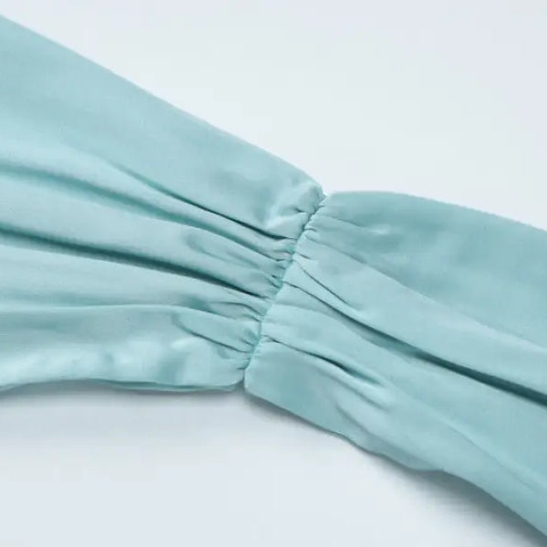 Mint green satin halter backless dress with gathered elastic ruching detail