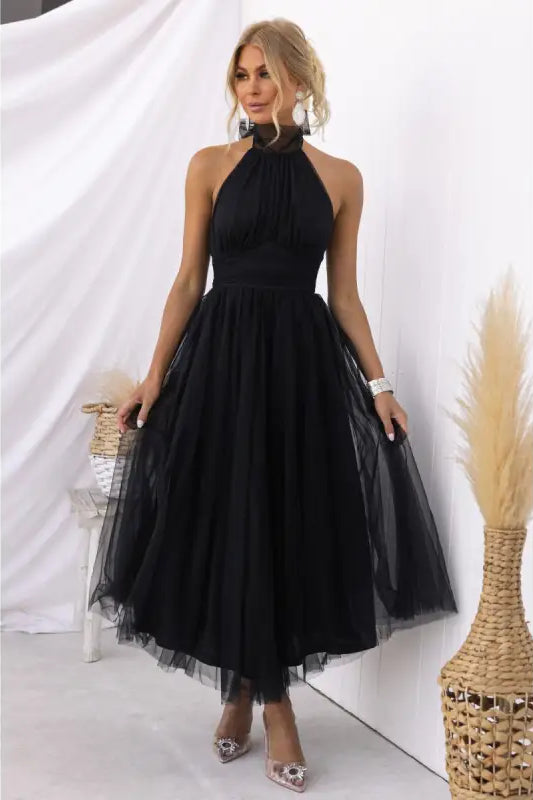 Elegant black halter evening dress in tulle for summer occasions, stylish halter evening wear