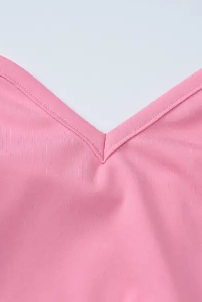 Pink V-neck garment showcasing an elegant halter high waist slim dress design