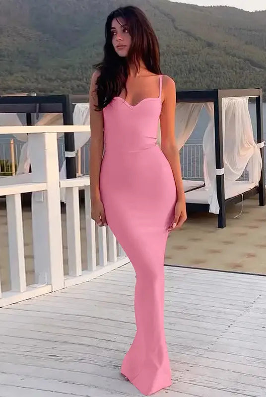 Pink fitted maxi dress featuring an elegant halter high waist design and sleeveless split style