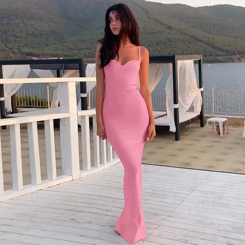 Pink fitted maxi dress featuring an elegant halter high waist design and sleeveless split style