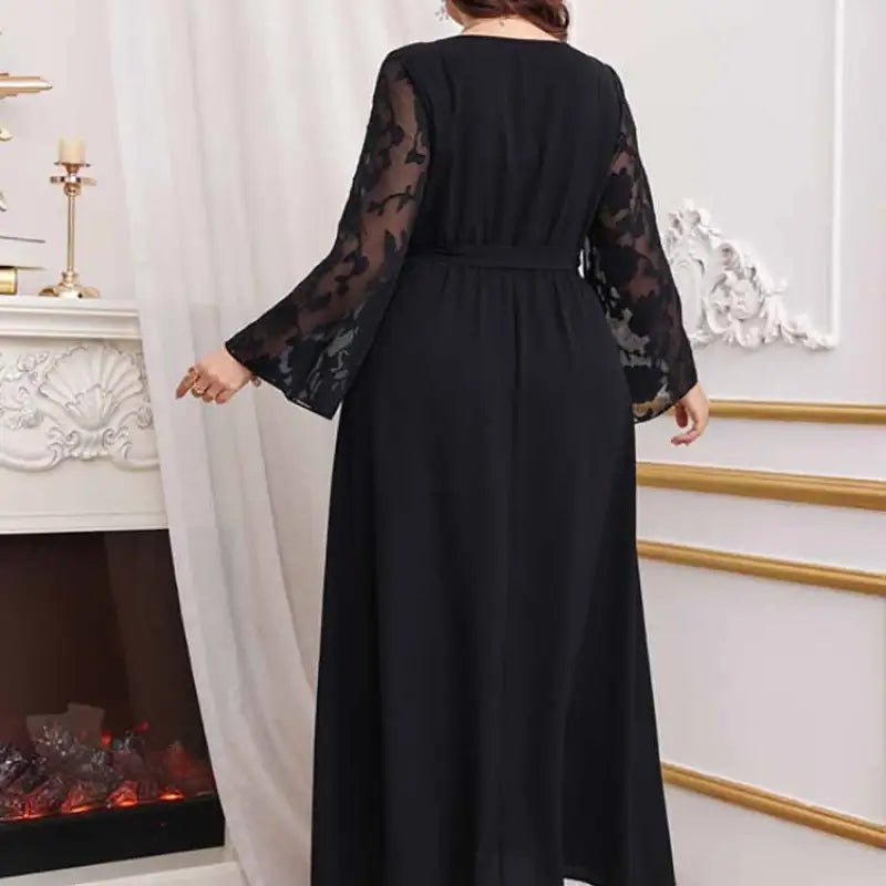 Elegant high waist black maxi dress with sheer floral lace bell sleeves and cinched waist