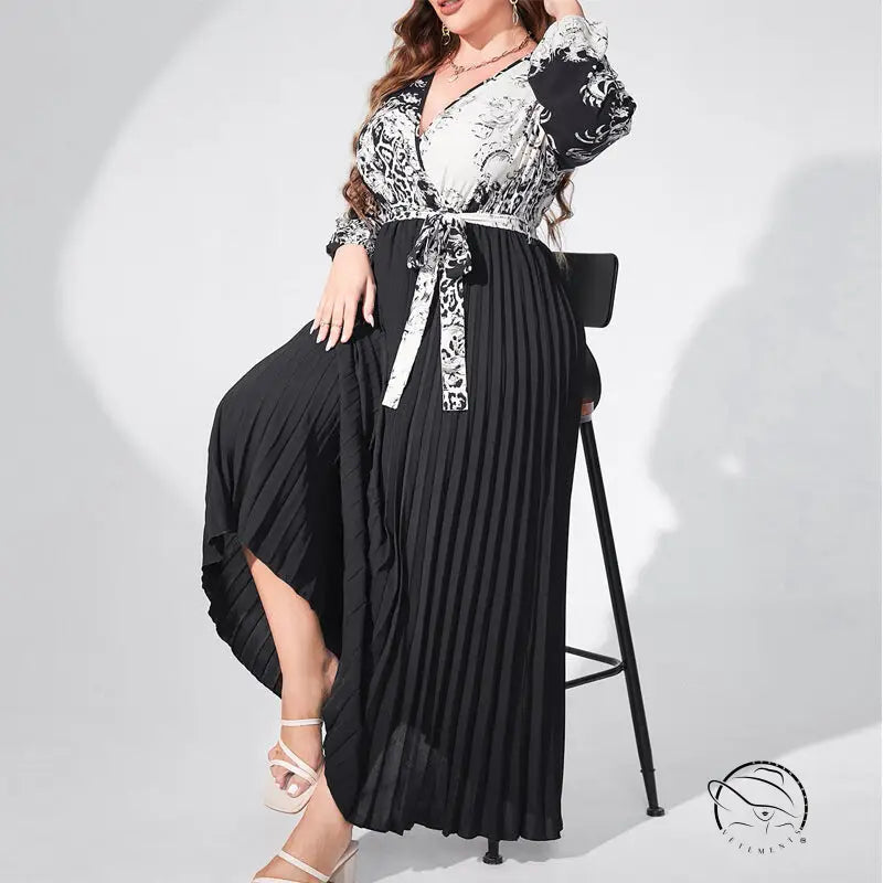 Elegant high waist maxi dress with black and white pattern, pleated skirt and tie waist