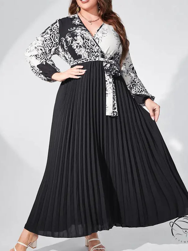Elegant high waist maxi dress with belted V-neck, lantern sleeves, patterned top and pleated skirt