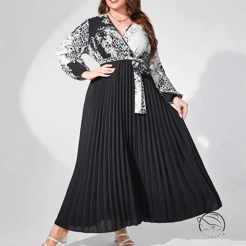 Elegant high waist maxi dress with belted V-neck, lantern sleeves, patterned top and pleated skirt