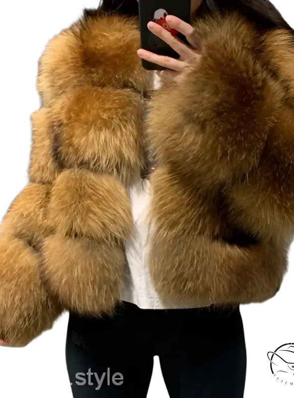 Elegant imitation raccoon fur coat in plush golden-brown tones