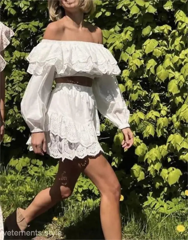 White off-shoulder lace dress with puffy sleeves and belted waist, ideal for jacquard ultra short style