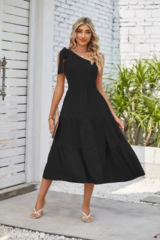 Woman wearing Elegant Layered Slit Dress with shoulder pleated layered design
