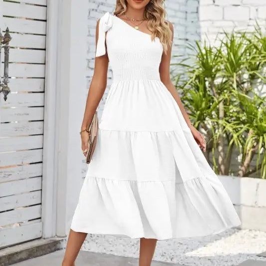 White one-shoulder pleated layered slit dress showcased in Elegant Layered Slit Dress with One Shoulder