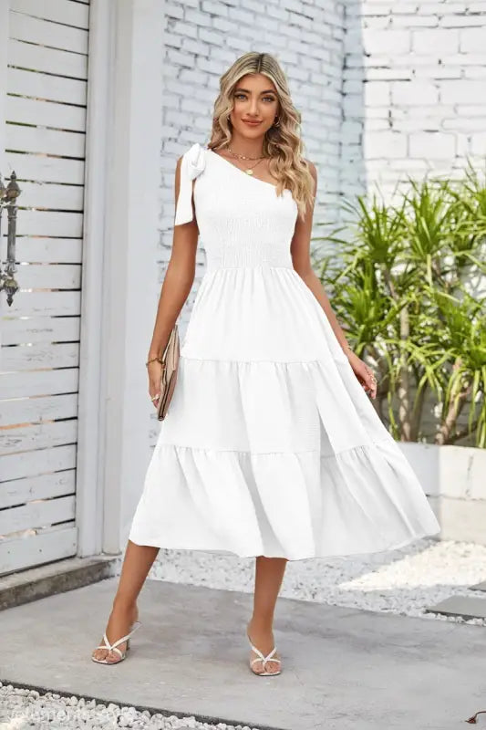 White one-shoulder pleated layered slit dress showcased in Elegant Layered Slit Dress with One Shoulder