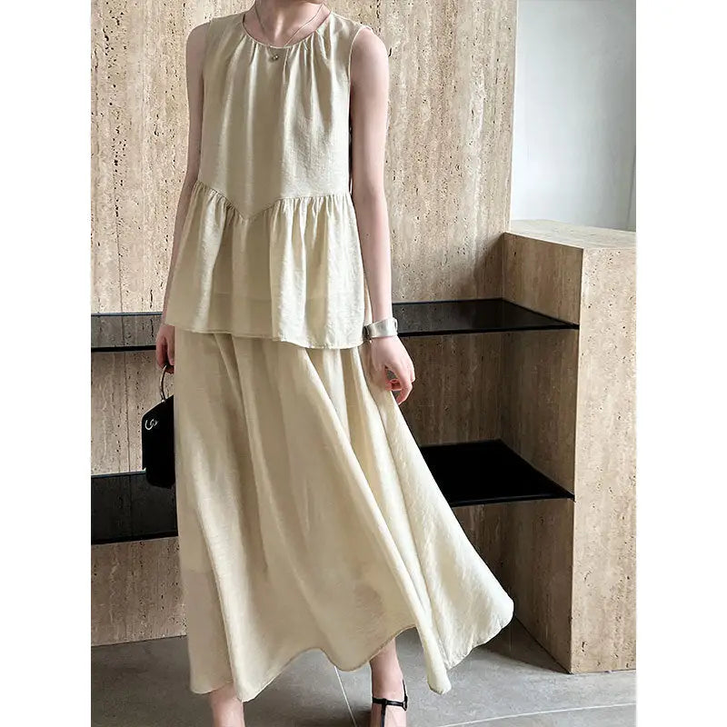 Beige sleeveless lightweight loose Tencel midi top and skirt set with cutout design