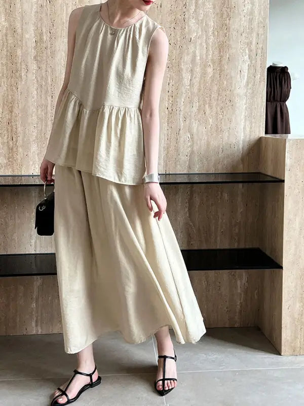 Beige linen two-piece loose Tencel suit featuring an elegant lightweight midi top design