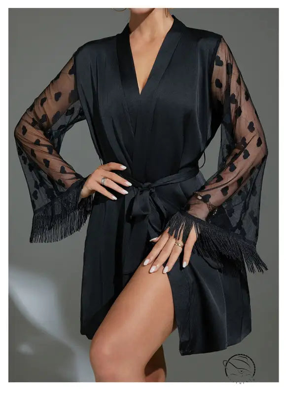 Black satin ice silk robe with sheer heart-patterned sleeves and fringed cuffs