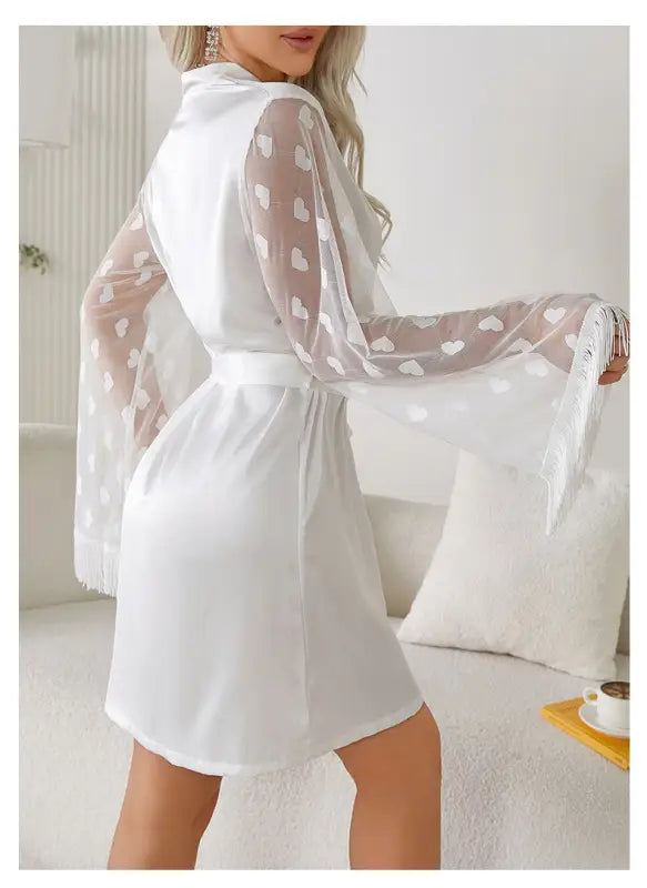 White satin robe with sheer heart-patterned bell sleeves from Elegant Long Sleeve Ice Silk Morning Gown with Fringe and Lace Details