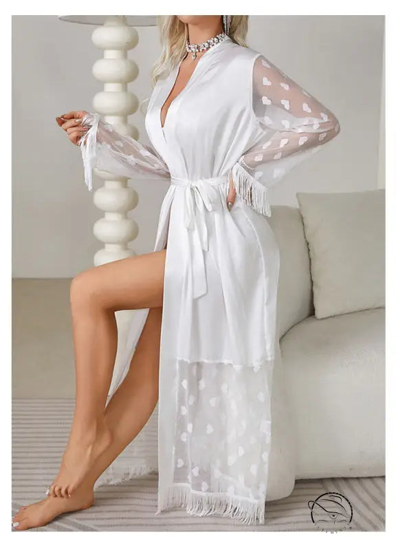 Elegant white silk cardigan robe with polka dot sleeves and fringe trim