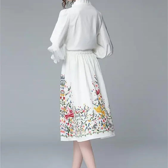 Woman in white floral dress showcasing an Elegant Long Sleeve Two Piece Set inspired by French Countryside Style