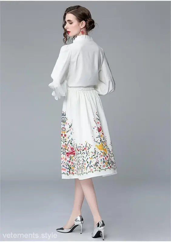 Woman in white floral dress showcasing an Elegant Long Sleeve Two Piece Set inspired by French Countryside Style