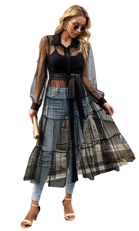Woman in sheer polka dot summer mesh dress showcasing elegant long sleeve waist design