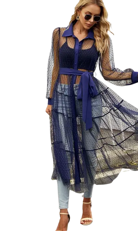 Woman in sheer polka dot summer mesh long sleeve waist dress
