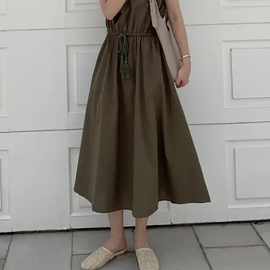 Olive green midi dress with cap sleeves and a drawstring waist.
