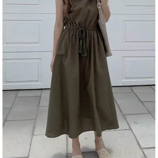 Olive green maxi dress with cap sleeves and a drawstring waist.