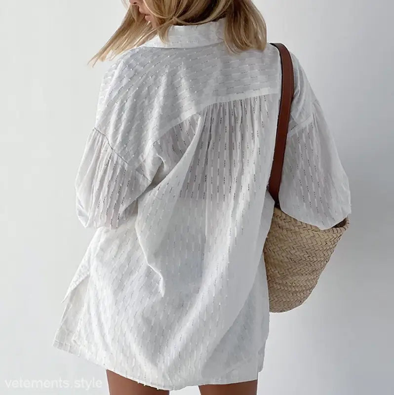 White textured oversized shirt showcasing elegant design for office suit in spring and fall
