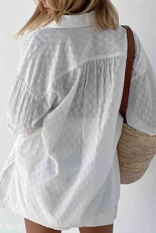 White textured oversized shirt showcasing elegant design for office suit in spring and fall