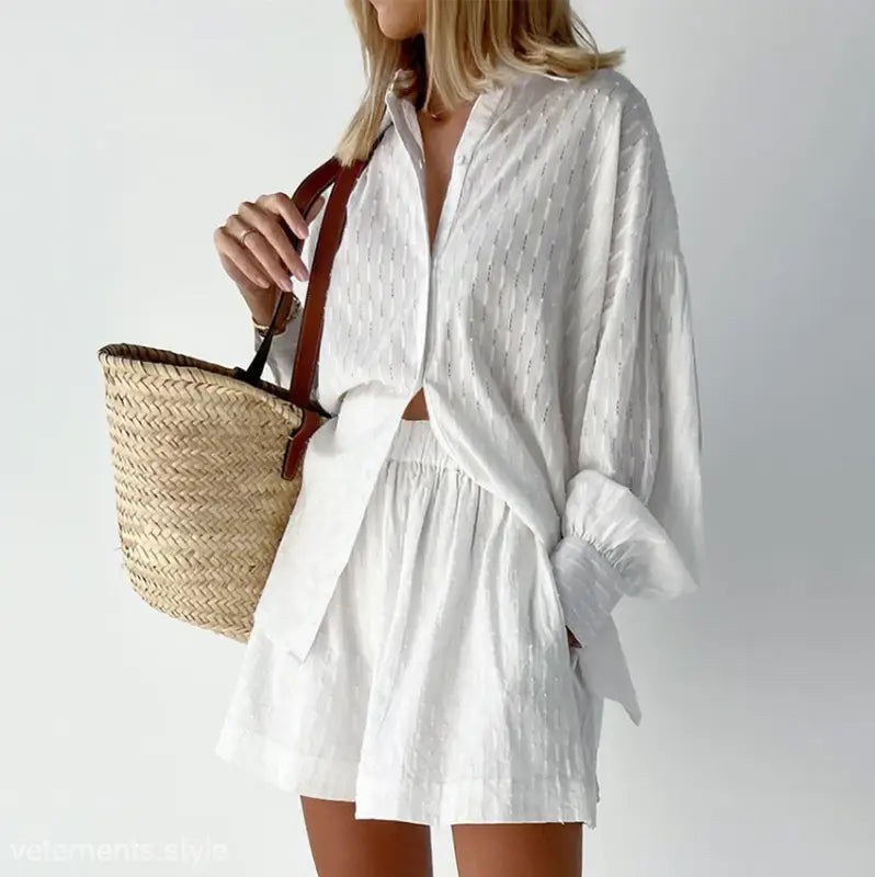 White linen shorts office suit with elegant design and straw tote for Spring and Fall