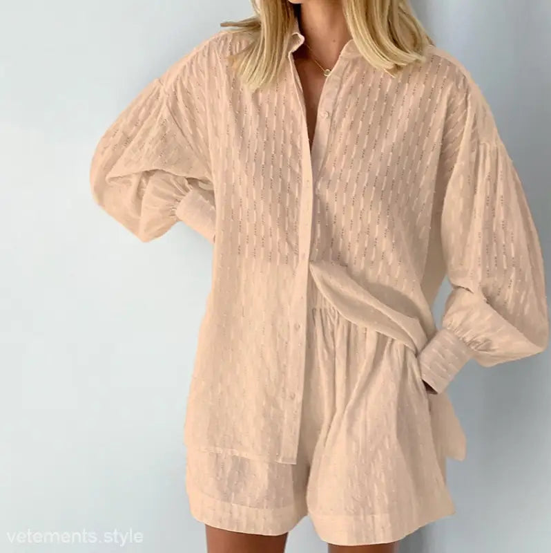 Beige button-down shirt and shorts office suit featuring elegant design for spring and fall