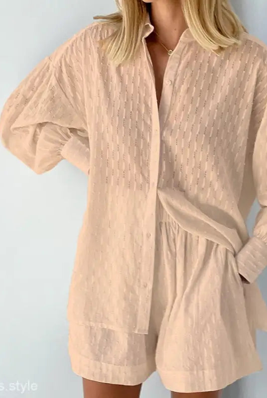 Beige button-down shirt and shorts office suit featuring elegant design for spring and fall