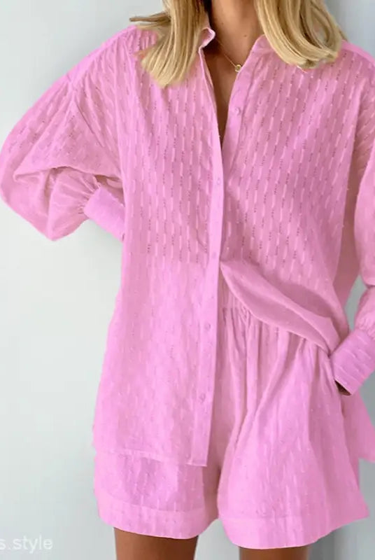 Pink two-piece shorts set featuring elegant design for a stylish office suit look