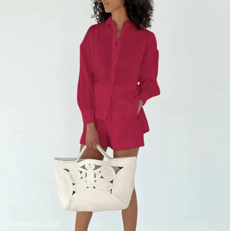 Woman’s elegant design pink linen shorts office suit with a white tote bag