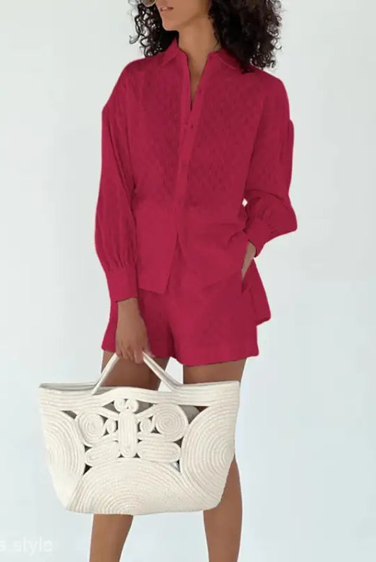 Woman’s elegant design pink linen shorts office suit with a white tote bag