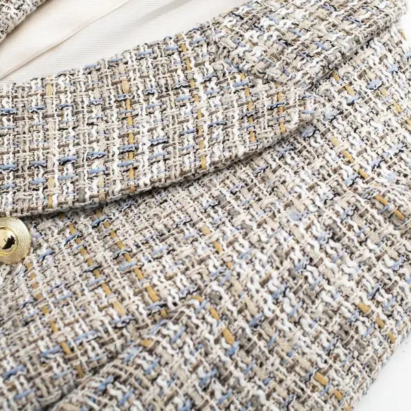 Elegant Loose Houndstooth Blazer featuring a lapel and gold button for stylish office wear