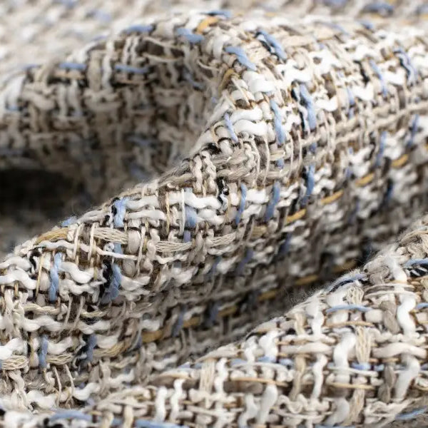 Woven fabric showcasing a textured multi-colored tweed for a loose houndstooth blazer