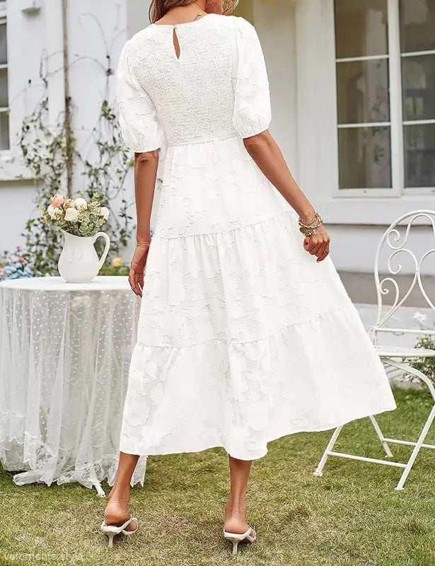 Elegant White Eyelet Midi Dress with Pleated Puff Sleeve and Cutout Detail