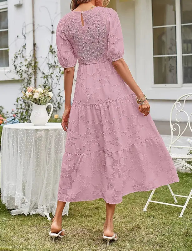 Elegant Pink Textured Midi Dress with Pleated Puff Sleeve and Cutout Detail