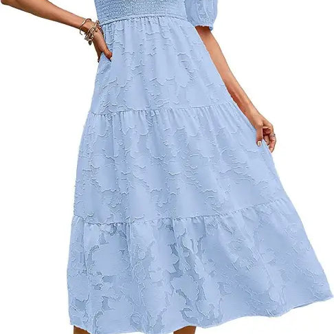 Light blue midi dress featuring pleated puff sleeve and elegant cutout detail